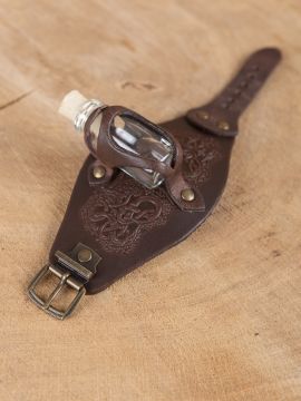 Bracelet with brown embossed potion bottle