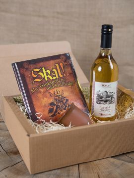 Gift box with mead, clay mug and book