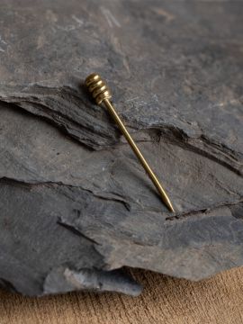 Brass giving pin