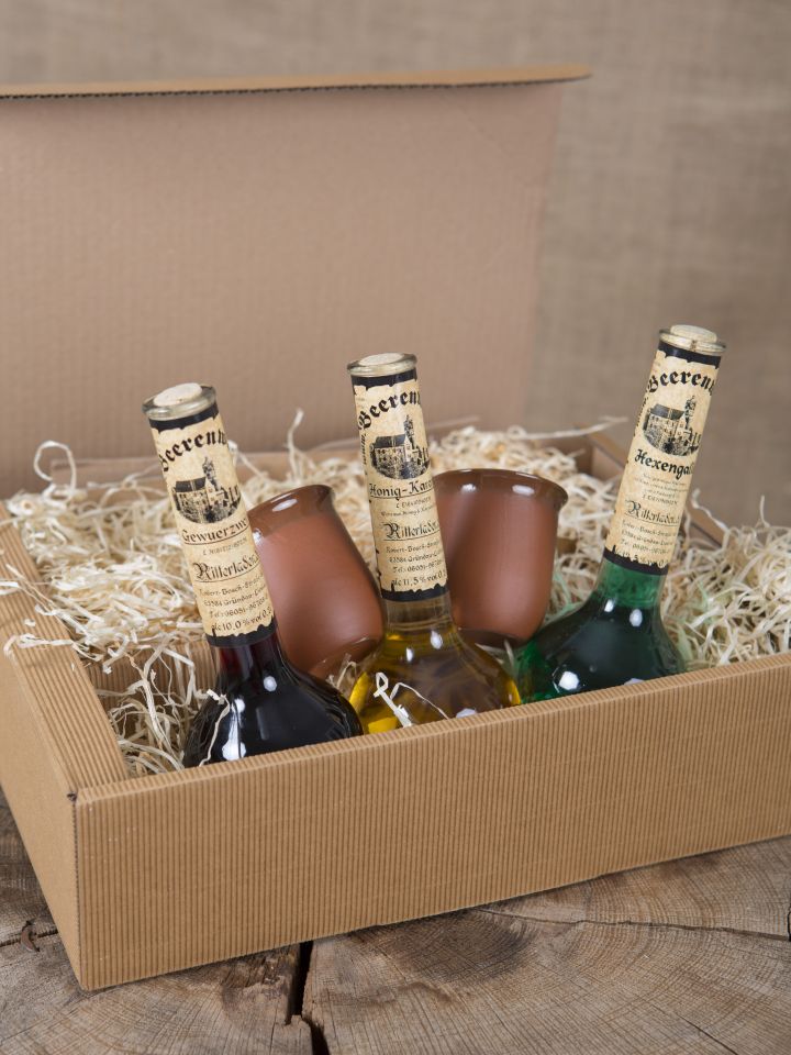 Gift box with 3 elixir bottles and two clay cups