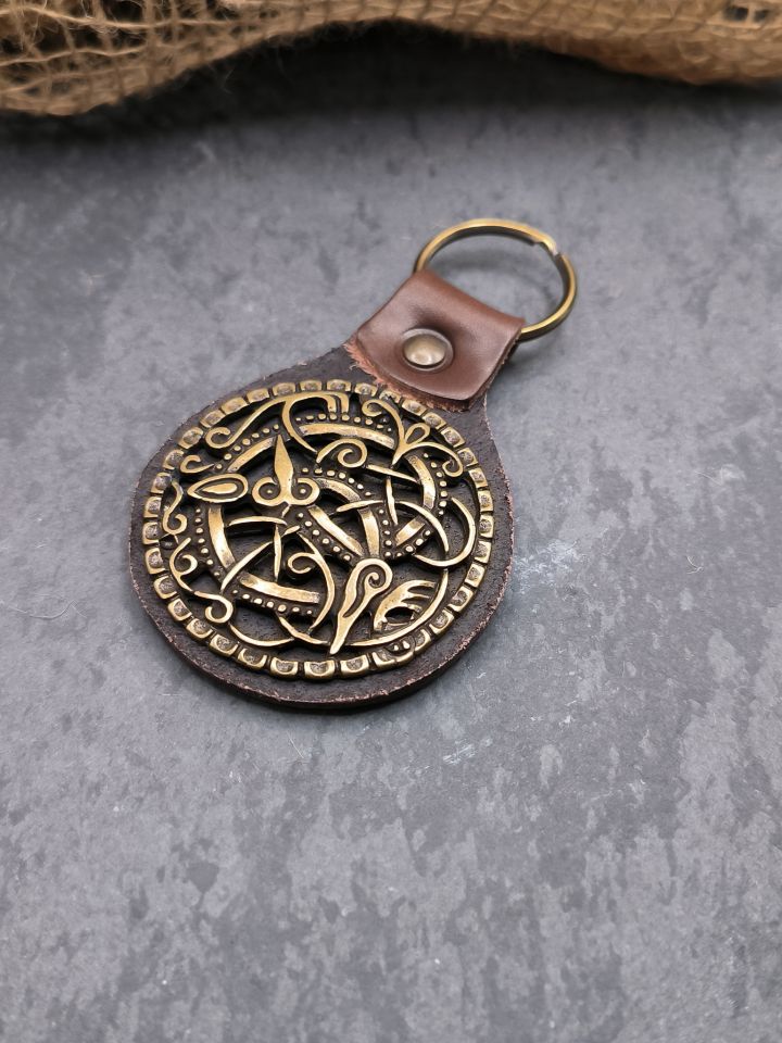 Key fob with brown snake brooch