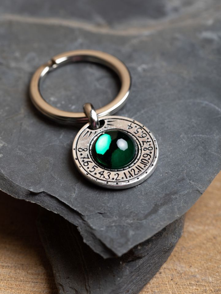 Key fob with Saturn emerald