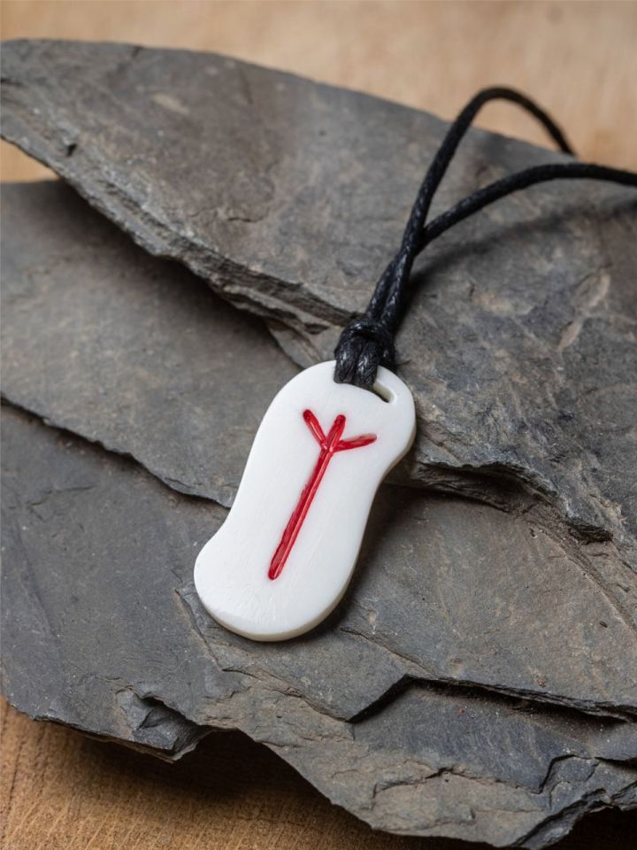 Runic pendant made from bone Algiz