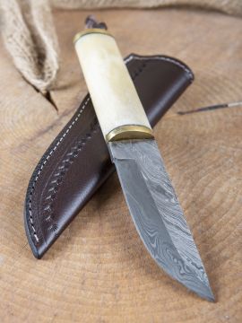 Utility knife made of Damascus steel with bone handle