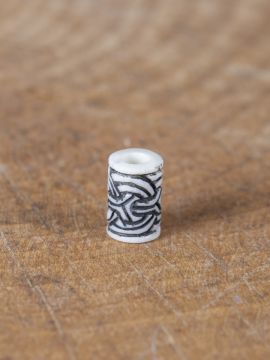 Bone bead with Viking knot pattern